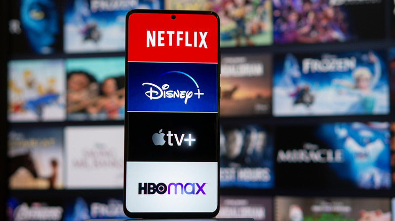 Netflix, Disney+, AppleTV, and HBOmax logo on mobile screen