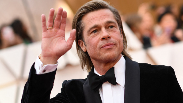 Brad Pitt waving
