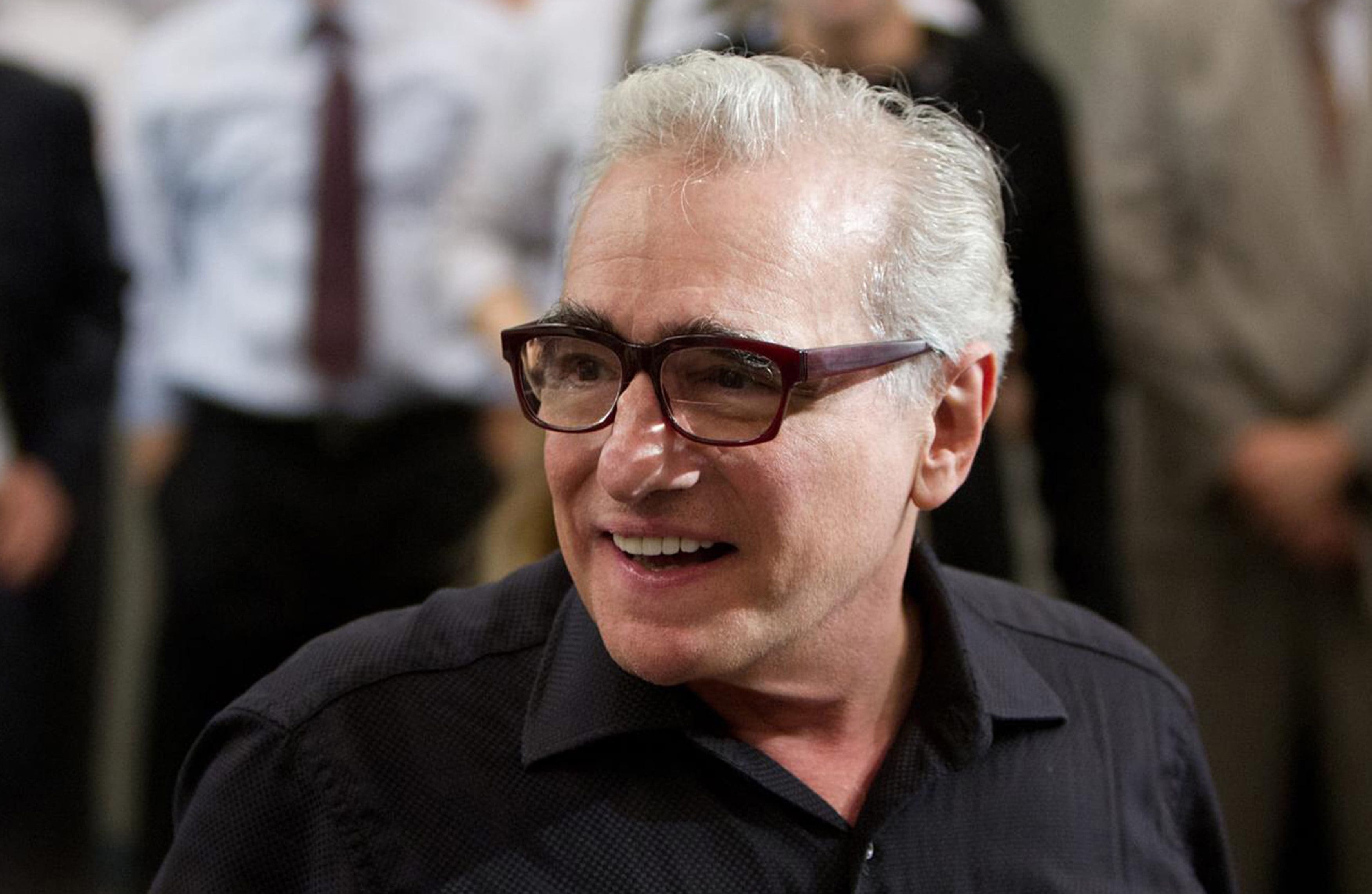 Martin Scorsese wearing a black polo