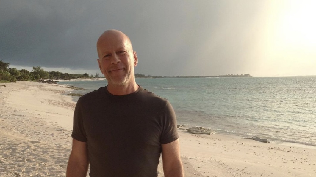 Bruce Willis wearing a black shirt