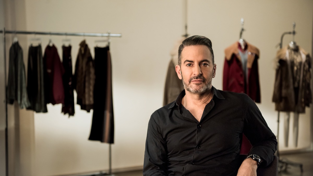 Marc Jacobs wearing a black polo long sleeves
