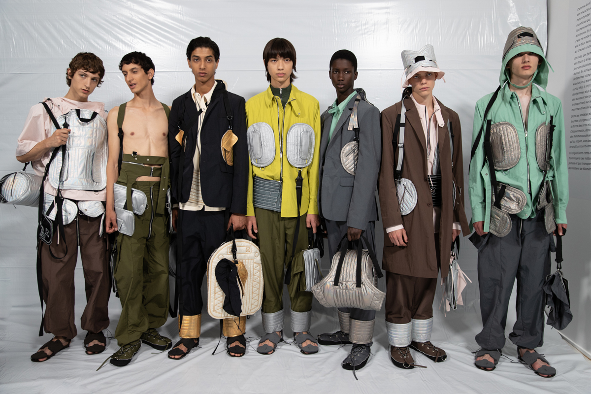 Several men wearing a sustainable fashion cloth with different colors