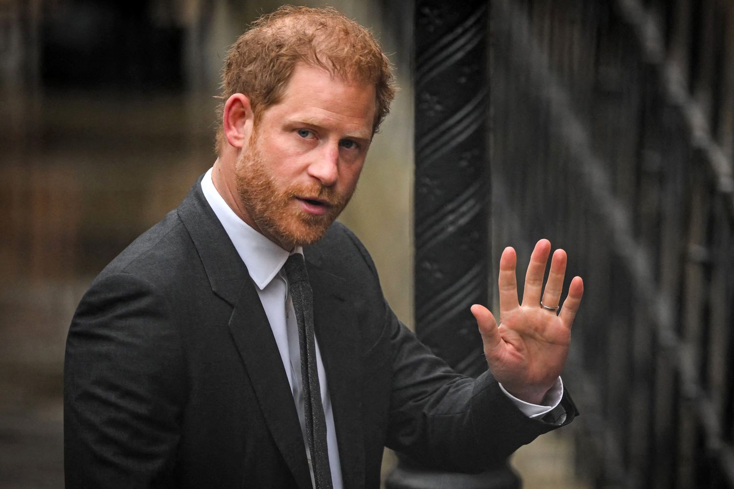 Prince Harry wearing a black suit