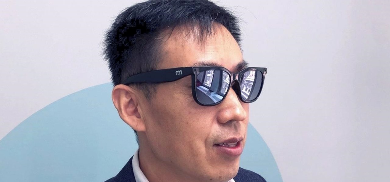 A man wearing the Norm smart glasses