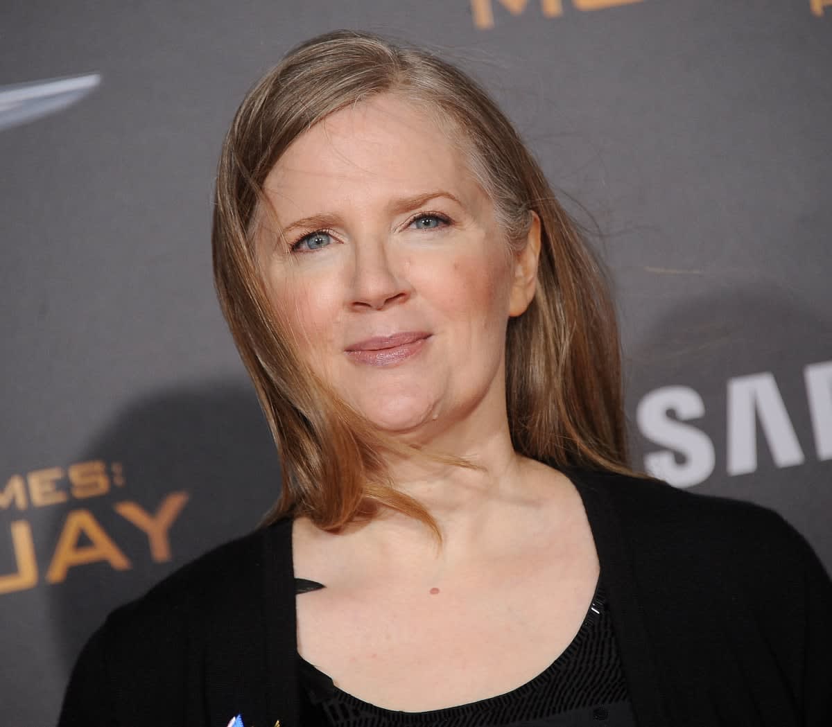 Suzanne Collins wearing a black cardigan