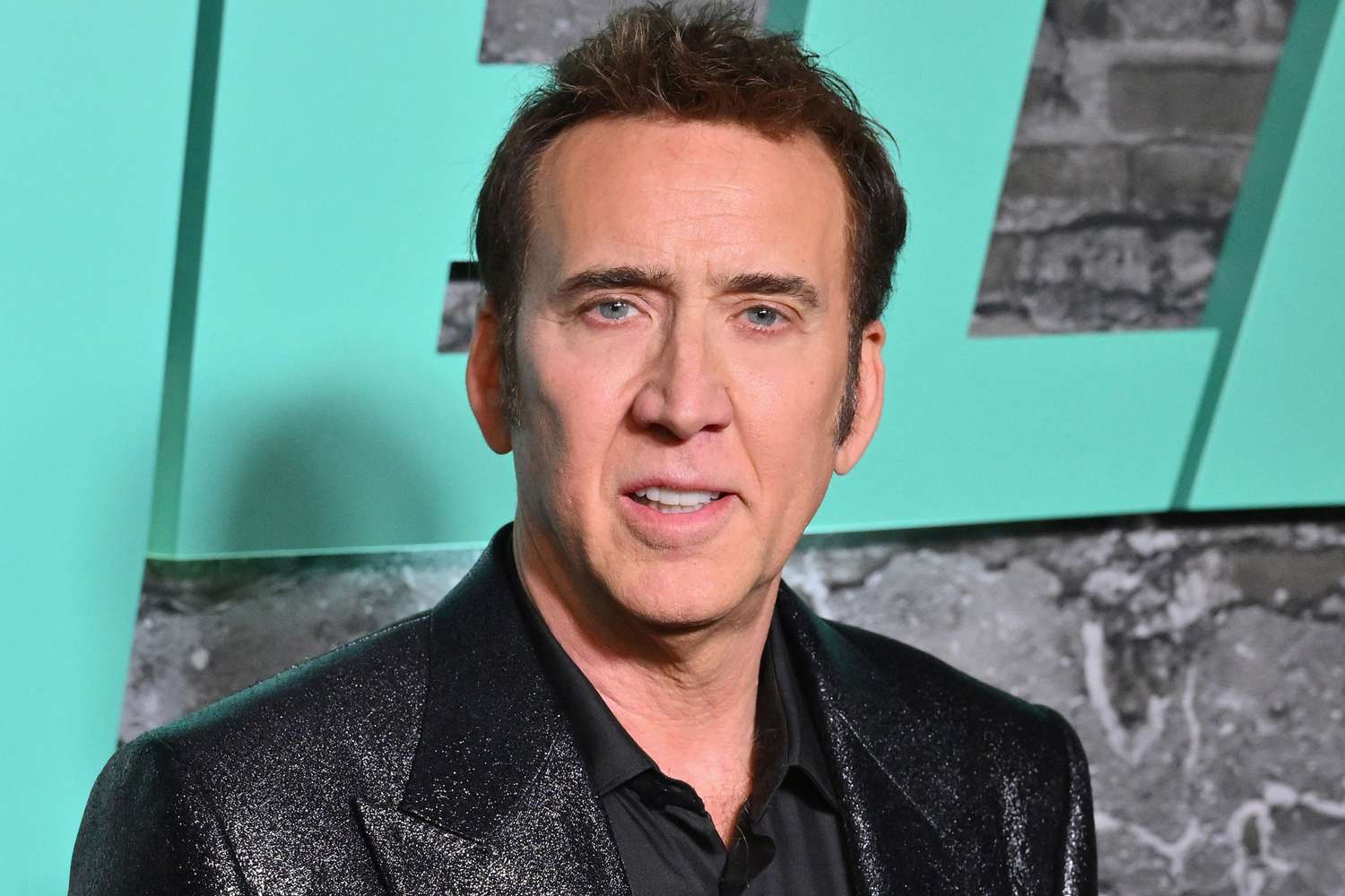 Nicolas Cage wearing a sparkly black coat
