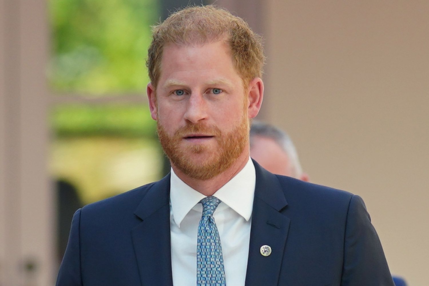 Prince Harry wearing a blue suit