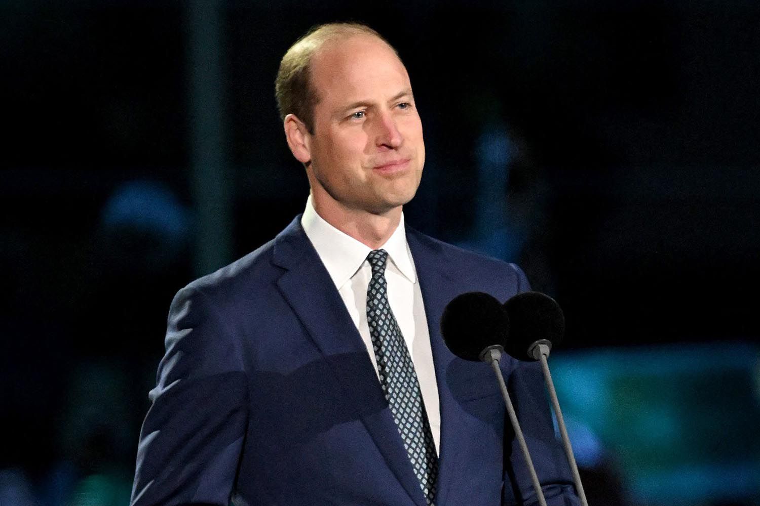 Prince William wearing a blue suit