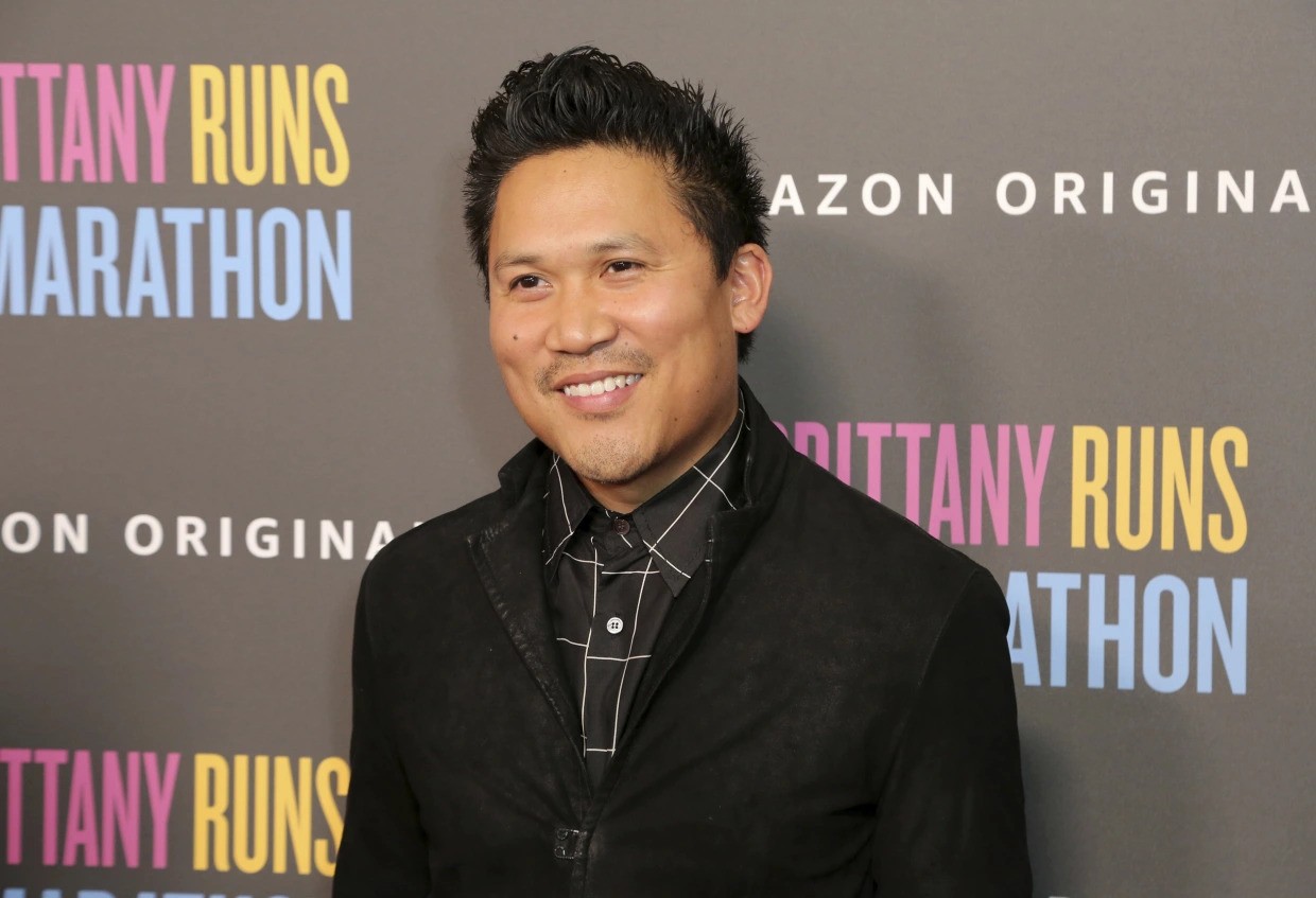 Dante Basco wearing a black suit at an event