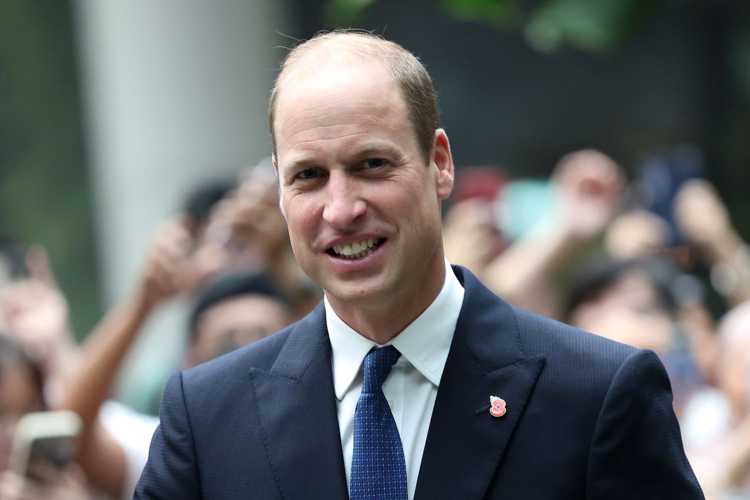 Prince William wearing a black suit